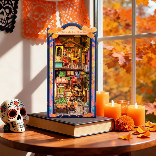 Book Nook Plaza de los Muertos posé près d'une fenêtre avec crâne mexicain et bougies