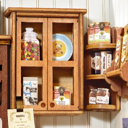 Gros plan sur l’armoire aux pots de miel et bouteilles de lait