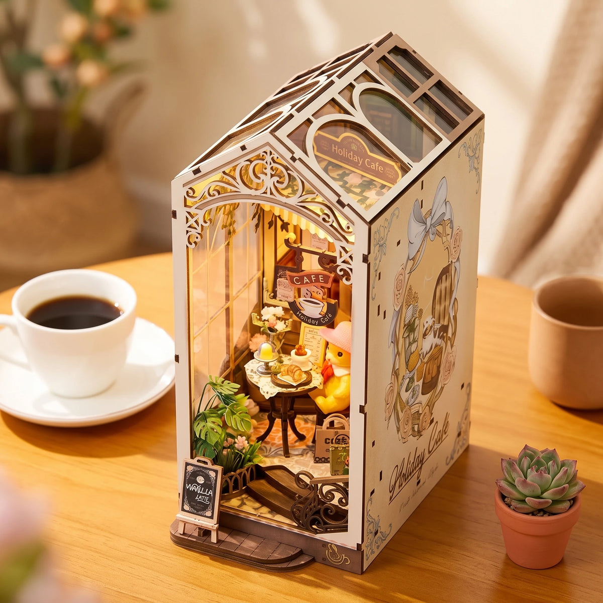Vue plongeante du book nook Holiday Café, toit vitré en pignon