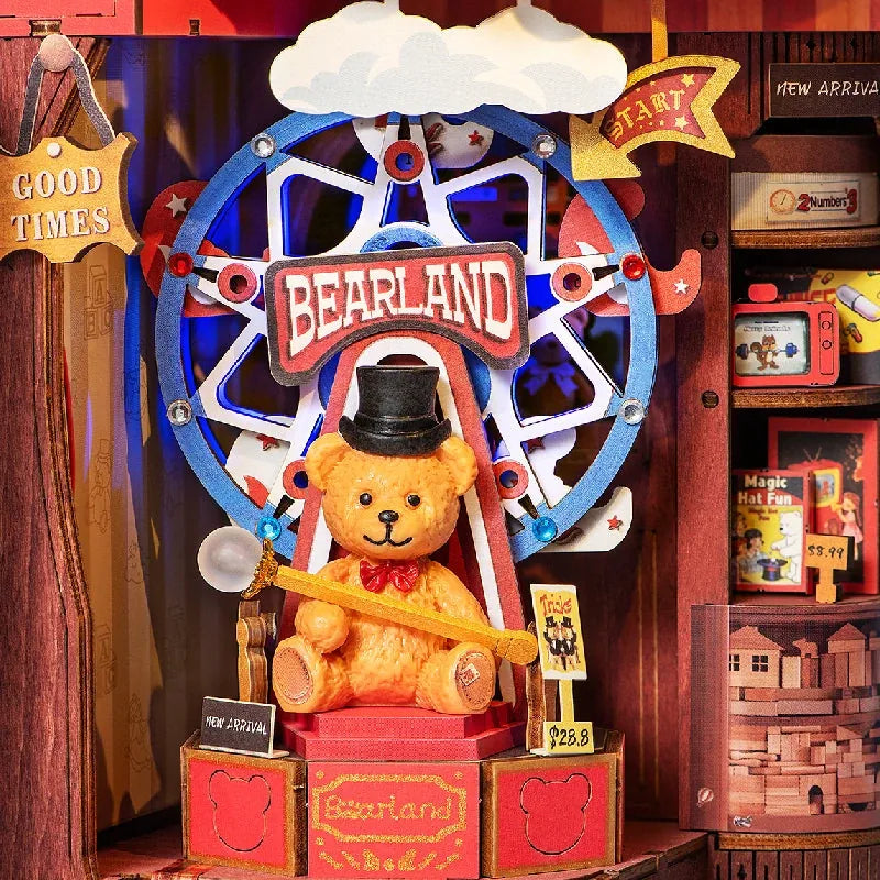 Un ours magicien devant sa grande roue