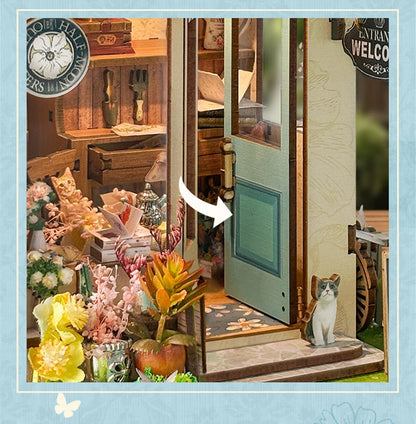Détail Spring Island, ouverture porte d'entrée avec chat. book nook