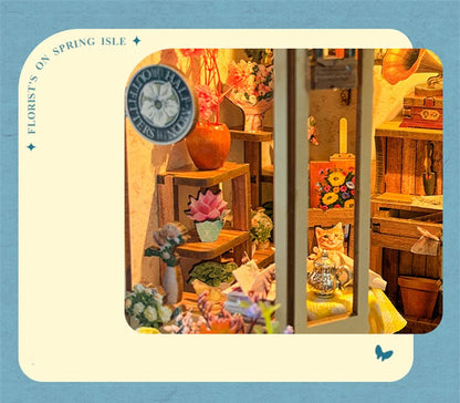 détail maquette book nook Spring island. avec pots de fleur et déco intérieur. Book nook