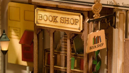 Enseigne Book Shop suspendue et lampadaire du book nook Sunshine Town
