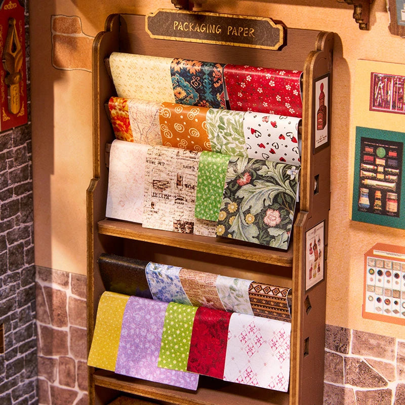 Présentoir de papiers d’emballage à motifs fleuris dans le book nook papeterie