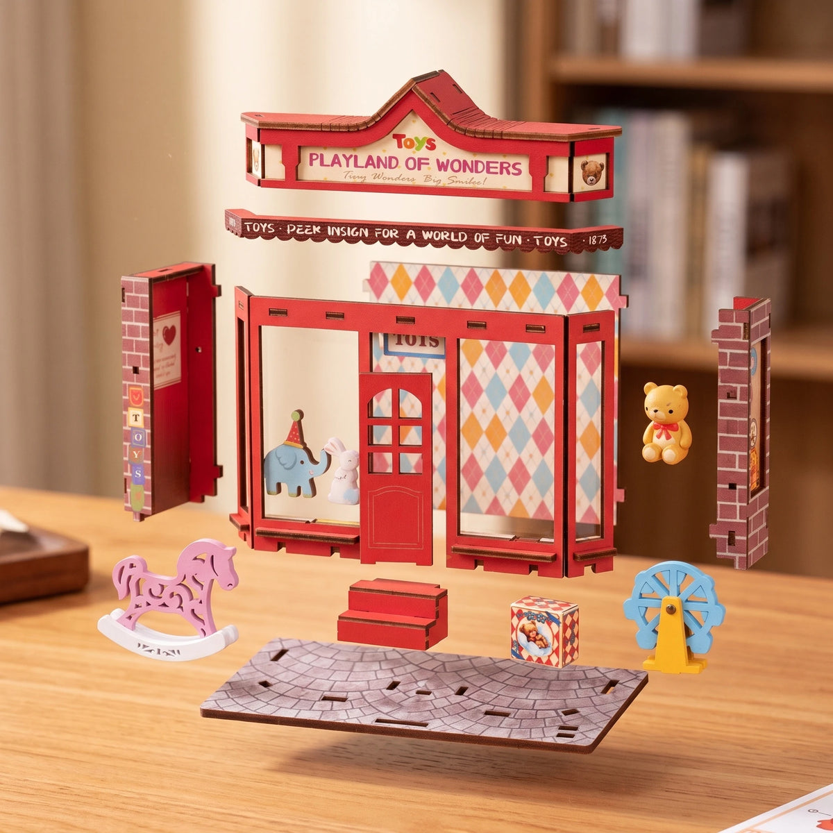 Vue éclatée du kit Whimsy Toy Shop, façade, murs, toit, socle et jouets séparés