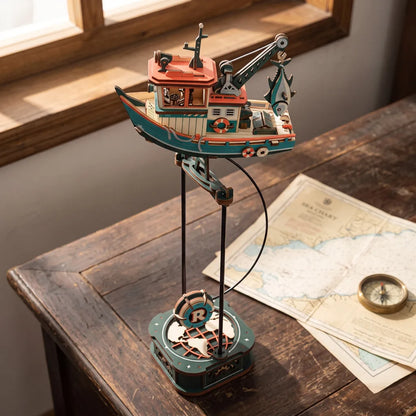 Puzzle 3D chalutier en balancier vu de haut, toit corail et socle mappemonde