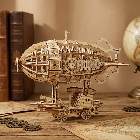 Puzzle 3D en bois thème Dirigeable Steampunk, vue Face, éclairage externe mettant en valeur la maquette, décoration Nook-It.