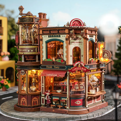 Devanture éclairée du Dream Coffee Factory dans une rue ensoleillée