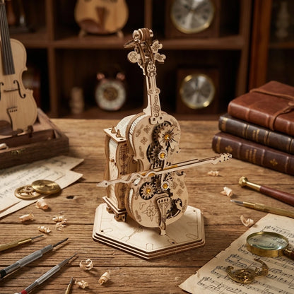 Puzzle 3D en bois thème Le Violoncelle Automate , vue plongeante, éclairage externe mettant en valeur la maquette, décoration Nook-It