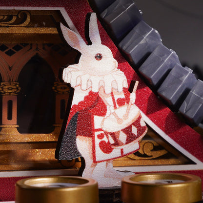 Petit lapin blanc au tambour peint sur la machine à écrire magique ROKR