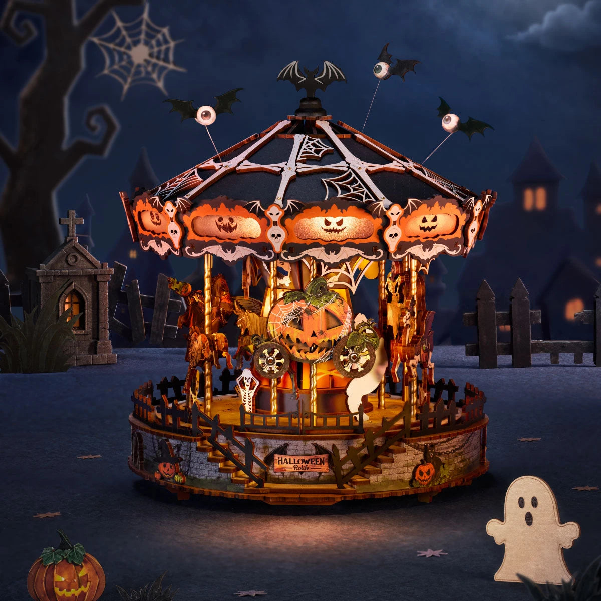 Phantom Waltz illuminé dans un décor de cimetière d'Halloween avec un petit fantôme
