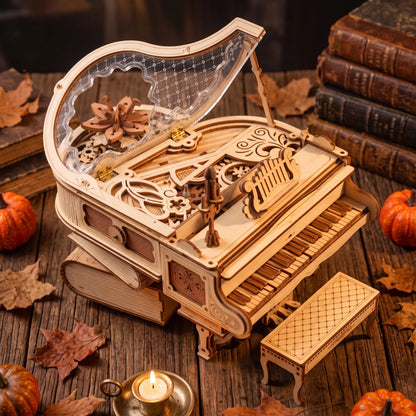 Piano magique ROKR vu de dessus, fleur et engrenages sous le couvercle transparent